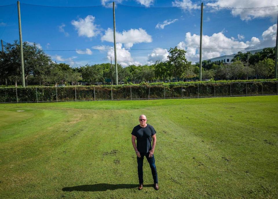 Jim Ferguson, president of Costa del Sol Home Association, stands on Aug. 16, 2023 in the Costa Del Sol Golf Club turf next to the property line that would be altered, if developer Edward Abbo of the Apollo Companies builds the Oasis Doral residential and commercial project at the intersection of Doral Boulevard and Northwest 97th Avenue. It would back up to a pair of longstanding developments of modest two-story townhomes Villas of Amberwood surrounding Costa del Sol Golf Club.