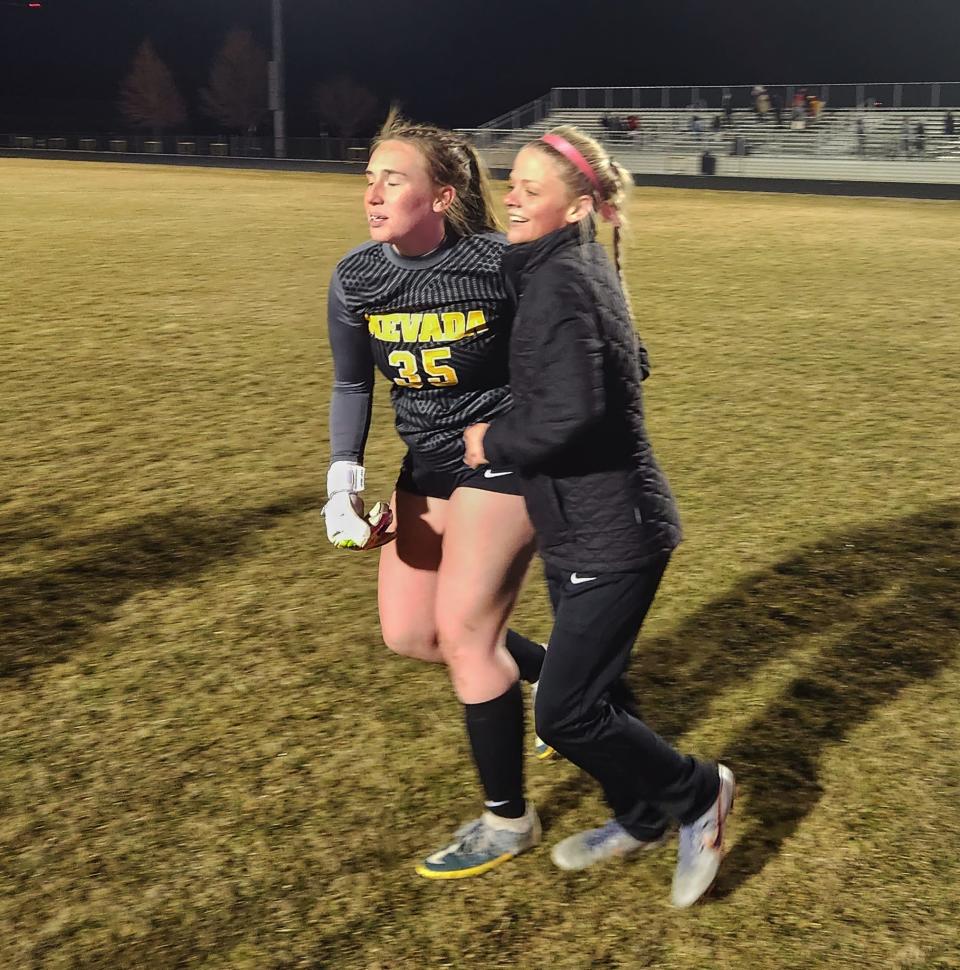 Joslynn Farmer (35) gets ready to go celebrate with the rest of her teammates following Nevada's 3-2 shootout victory over Gilbert to open the Iowa high school girls soccer season Monday at Cub Stadium in Nevada.