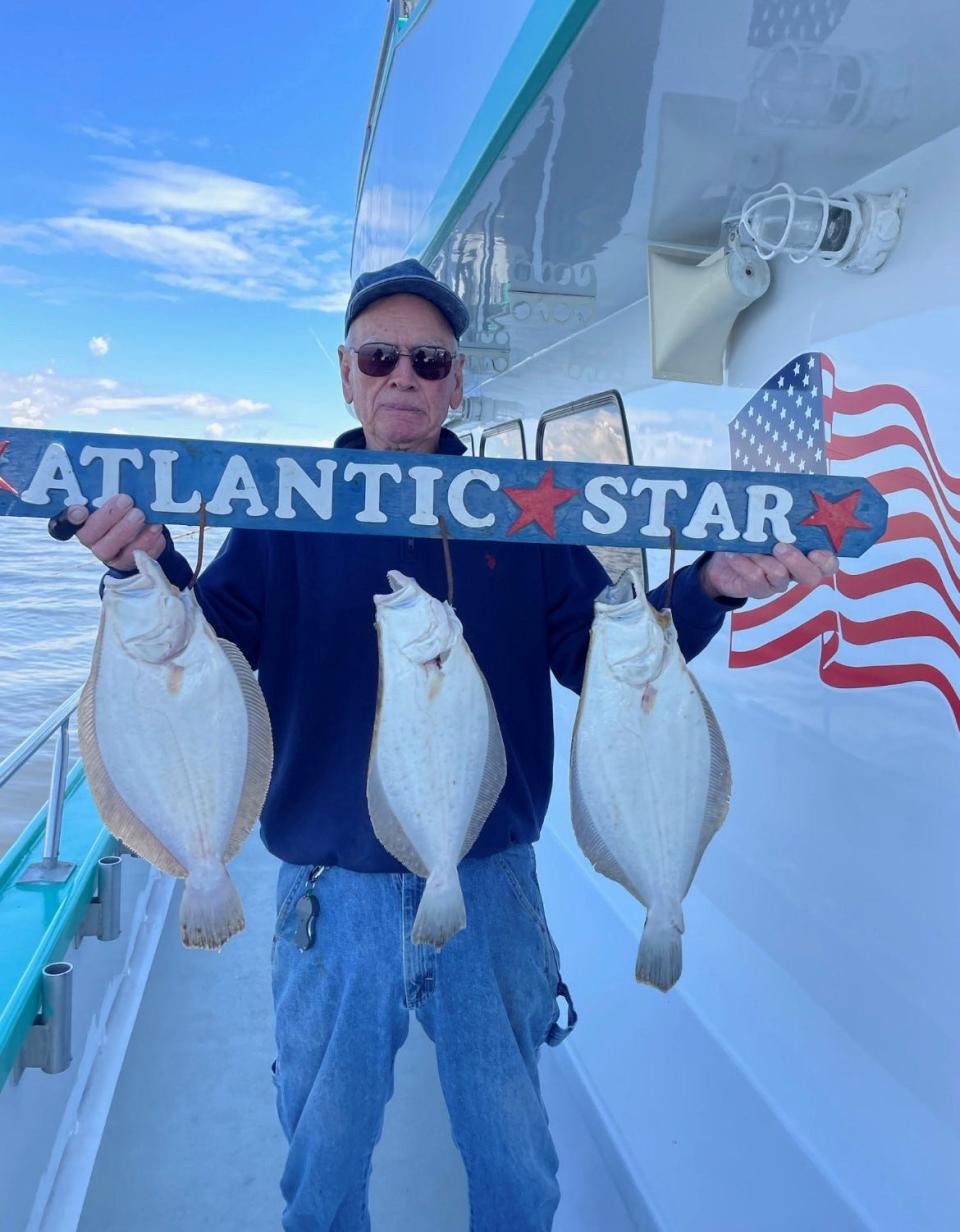 Jim Pepper of Edison with three keeper fluke aboard the Atlantic Star.