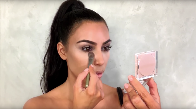 Watch the 'KUWTK' star create a gorgeous, smokey holiday makeup look on herself in the bathroom.
