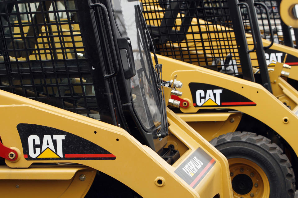 Caterpillar construction machines sit parked the Patten Cat dealership in Hammond, Indiana, October 20, 2006. Caterpillar Inc. reported weaker than expected quarterly earnings with shares down nearly 12 percent. REUTERS/Joshua Lott