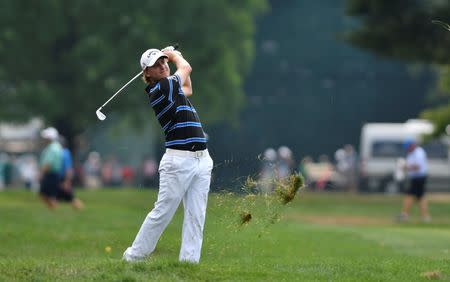 Jul 29, 2016; Springfield, NJ, USA; Emiliano Grillo hits his second shot on the 17th hole during the second round of the 2016 PGA Championship golf tournament at Baltusrol GC - Lower Course. Eric Sucar-USA TODAY Sports