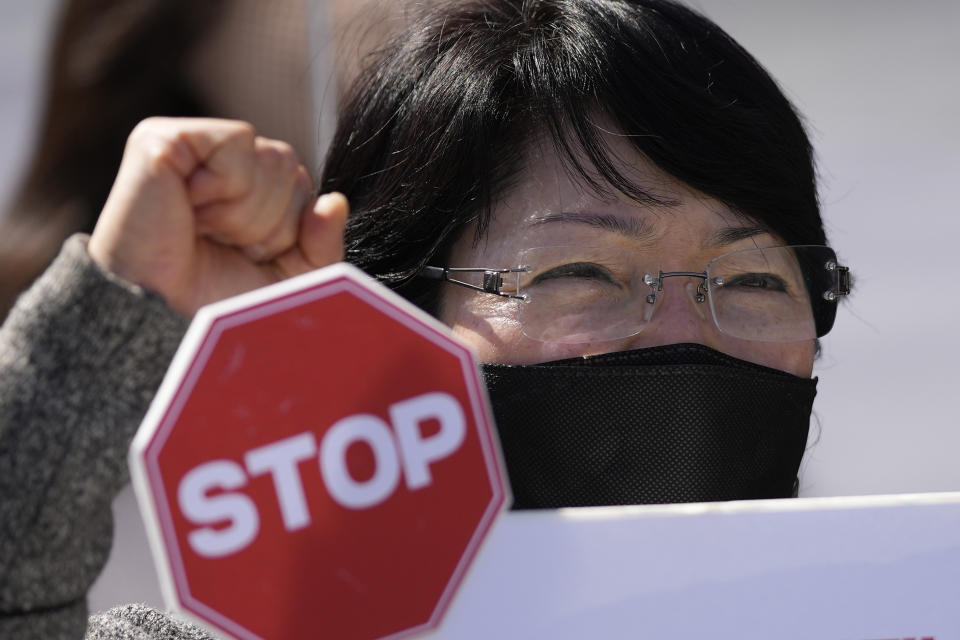 A protester shouts slogans during a rally to oppose the planned joint military exercises between the U.S. and South Korea in Seoul, South Korea, Monday, March 13, 2023. The South Korean and U.S. militaries launched their biggest joint military exercises in years Monday, as North Korea said it conducted submarine-launched cruise missile tests in apparent protest of the drills it views as an invasion rehearsal. (AP Photo/Lee Jin-man)