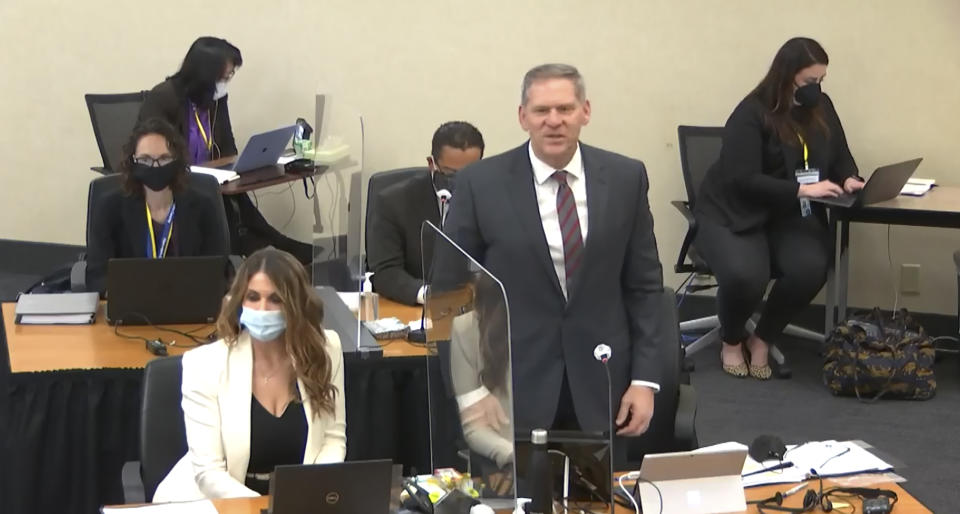 In this image taken from video, prosecutor Steve Schleicher introduces himself to potential jurors as Hennepin County Judge Peter Cahill presides over jury selection, Monday, March 22, 2021, at the Hennepin County Courthouse in Minneapolis, in the trial of former Minneapolis police officer Derek Chauvin. Chauvin is charged in the May 25, 2020, death of George Floyd. (Court TV via AP, Pool)