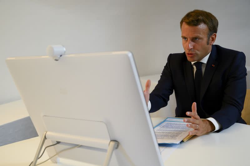 French President Emmanuel Macron speaks during a donor teleconference with other world leaders, in Bormes-les-Mimosas