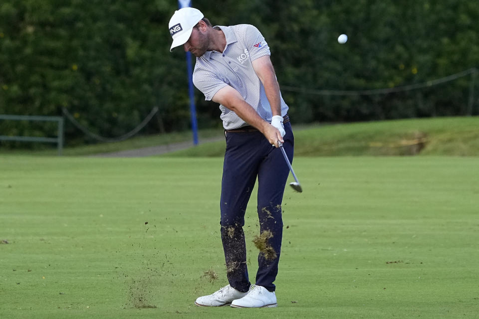 Austin Eckroat hits from the eighth fairway during the second round of the Sony Open golf event, Friday, Jan. 12, 2024, at Waialae Country Club in Honolulu. (AP Photo/Matt York)