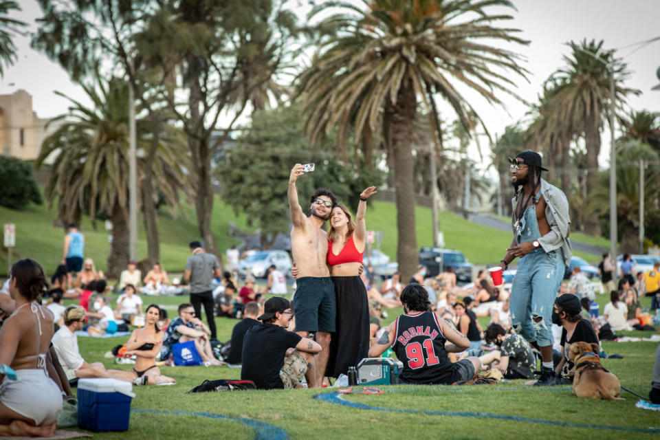 Melbourne residents flocked outside to parks and beaches to soak up the sun, prompting a warning from Daniel Andrews.