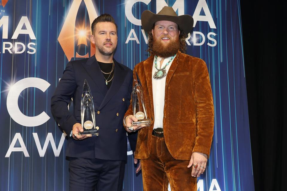 NASHVILLE, TENNESSEE - NOVEMBER 09: Vocal Duo of the Year winners T.J. Osborne and John Osborne of Brothers Osborne pose in the press room during The 56th Annual CMA Awards at Bridgestone Arena on November 09, 2022 in Nashville, Tennessee. (Photo by Jason Kempin/Getty Images)