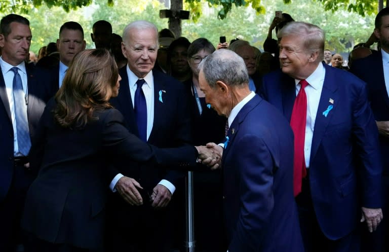 Kamala Harris shakes hands with Donald Trump during a remembrance ceremony on the 23rd anniversary of the September 11 terror attack (Adam GRAY)