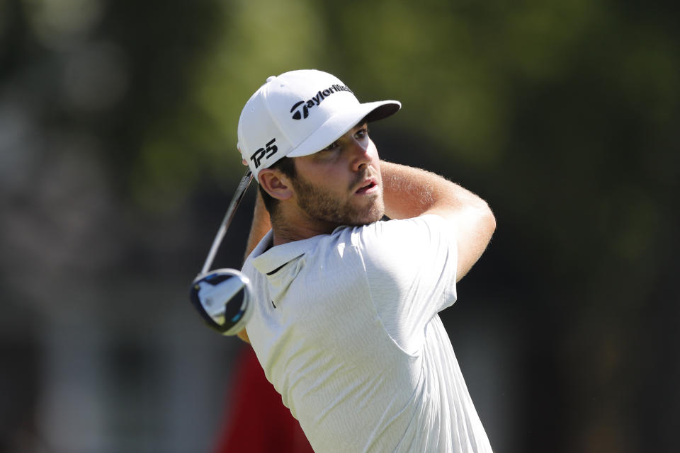 Matthew Wolff drives on the sixth tee during the second round of the Rocket Mortgage Classic golf tournament, Friday, July 3, 2020, at the Detroit Golf Club in Detroit. (AP Photo/Carlos Osorio)