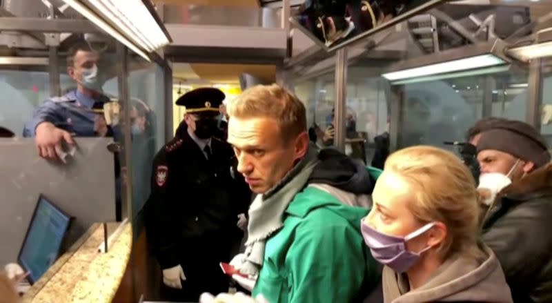 FILE PHOTO: Police officers detain Russian opposition politician Alexei Navalny in Moscow