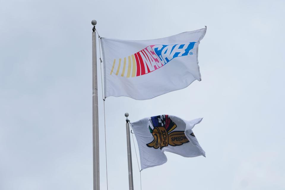 NASCAR and IMS flags fly Saturday, Aug. 12, 2023, ahead of a day full of NASCAR and IndyCar events at Indianapolis Motor Speedway.