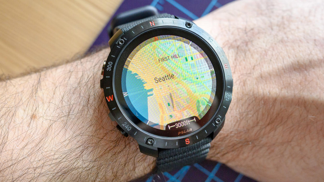  Polar Grit X2 Pro maps on a person's wrist. 