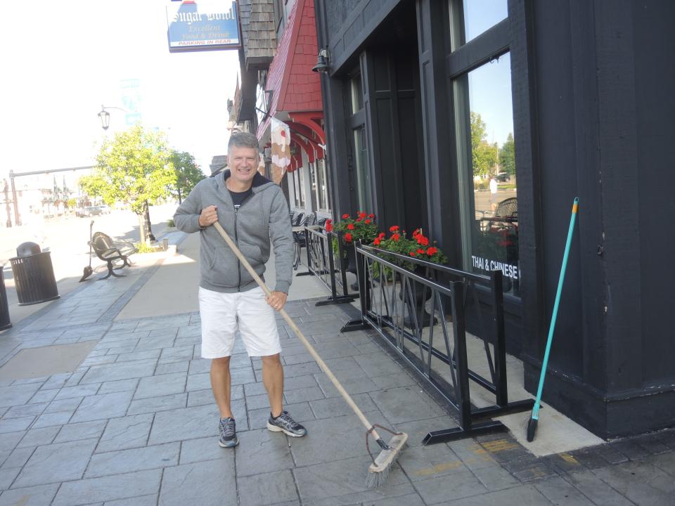 John Tithof of Gaylord helped to sweep Main Street in downtown Gaylord on July 11 right before Alpenfest takes over the area.