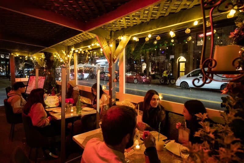 People enjoy outdoor dining at the Sveta restaurant as the spread of the coronavirus disease (COVID-19) continues, in New York City