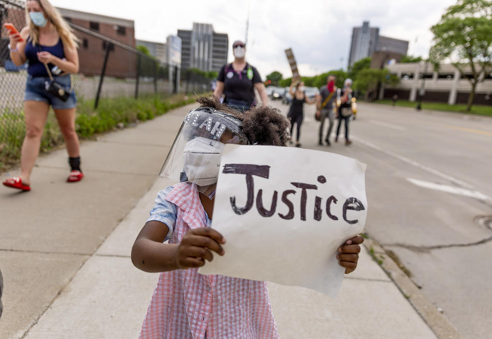 Laylah, 5, marches down Michigan Ave. on June 4, 2020 in Detroit. (Sylvia Jarrus / for NBC News)