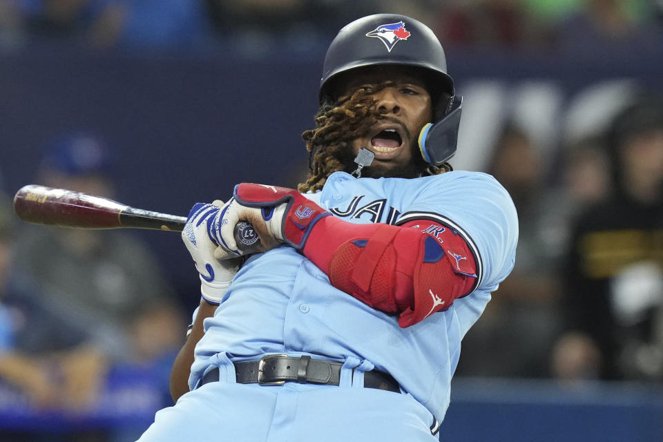 Toronto Blue Jays' Vladimir Guerrero Jr. reacts to an inside pitch from Baltimore Orioles' Yennier Cano during the eighth inning of a baseball game Friday, May 19, 2023, in Toronto. (Chris Young/The Canadian Press via AP)
