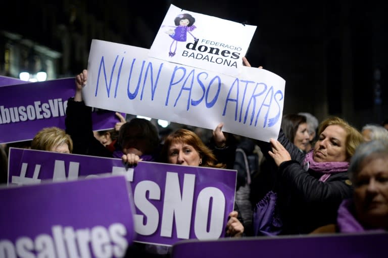 Women demonstrating in Barcelona waved banners bearing the slogan "no step backwards"as they showed their opposition to the far-right VOX party following its surprise capture of a dozen seats in Andalusia's regional elections last month