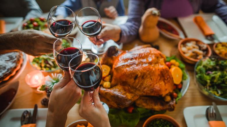 thanksgiving dinner spread with wine