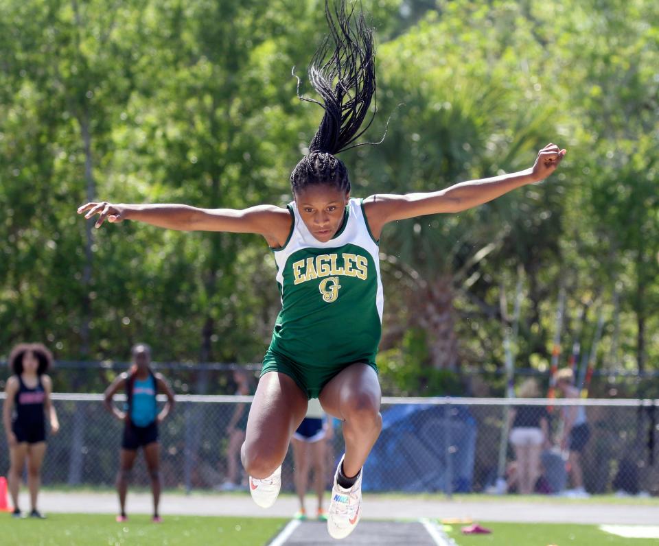 George Jenkins freshman Chelsi Williams competes in the triple jump on Saturday at the Class 4A, Region 2 track and field meet at Alonso High School in Tampa.