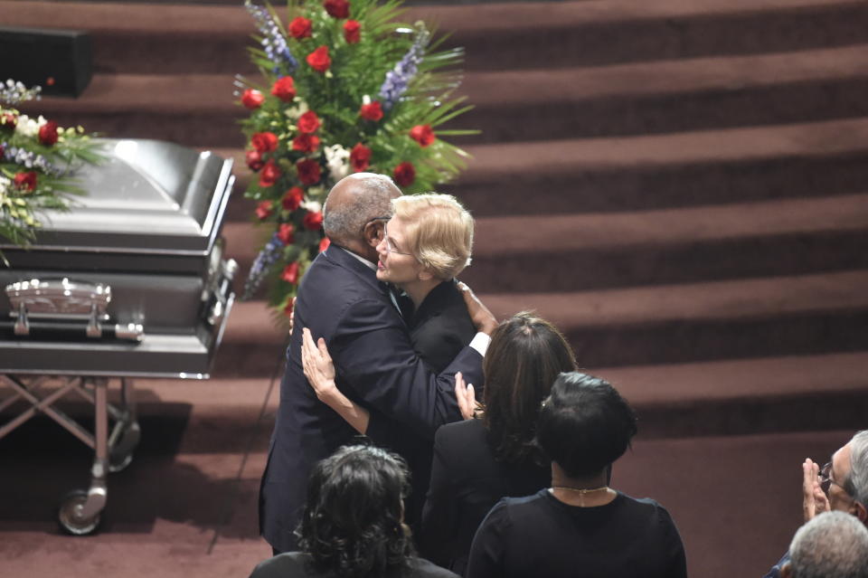 Democratic presidential contender Elizabeth Warren greets House Majority Whip Jim Clyburn at the funeral of his wife Emily on Sunday, Sept. 22, 2019, in West Columbia, S.C. (AP Photo/Meg Kinnard)