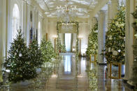 Cross Hall of the White House is decorated for the holiday season during a press preview of holiday decorations at the White House, Monday, Nov. 28, 2022, in Washington. (AP Photo/Patrick Semansky)