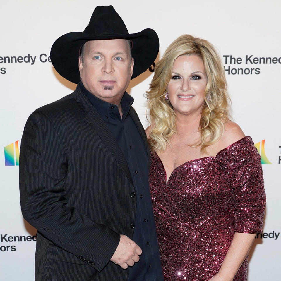 Garth Brooks and Trisha Yearwood arrive for the 42nd Annual Kennedy Awards Honors in Washington (Joshua Roberts / Reuters)