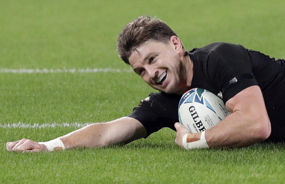 New Zealand's Beauden Barrett scores a try during the Rugby World Cup quarterfinal match at Tokyo Stadium between New Zealand and Ireland in Tokyo, Japan, Saturday, Oct. 19, 2019. (AP Photo/Mark Baker)