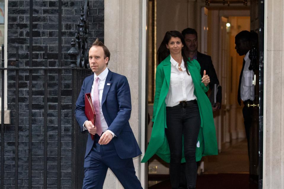 Matt Hancock leaving a Downing Street briefing with aide Gina Coladangelo  on May 1 (Getty Images)