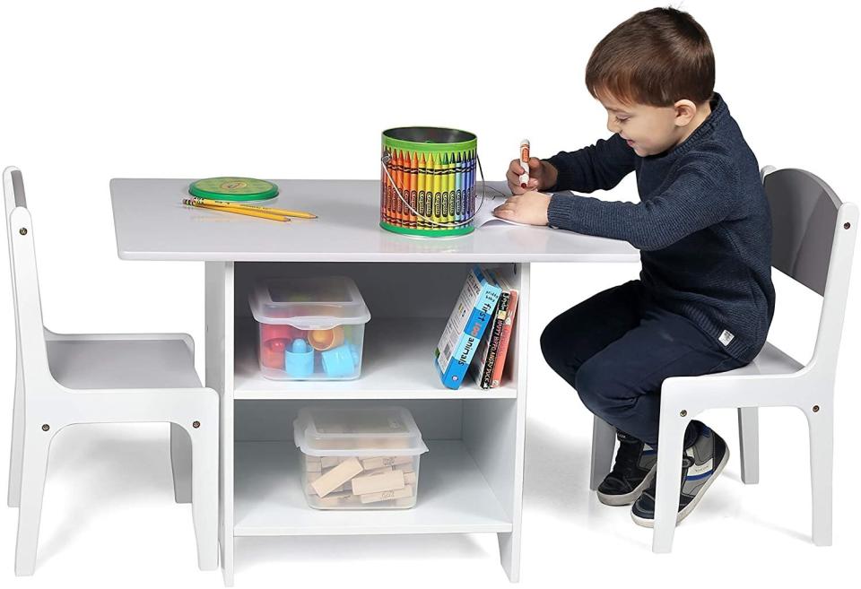 This set includes a table and two chairs, with storage shelves and baskets underneath. Once the kiddos are done with their homework, the table can turn into a play space for coloring. <a href="https://amzn.to/3eMCWix" target="_blank" rel="noopener noreferrer">Find it for $95 at Amazon</a>.