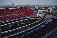 Downtown Los Angeles is seen from inside Los Angeles Memorial Coliseum ahead of a NASCAR exhibition auto race, Friday, Feb. 3, 2023, in Los Angeles. (AP Photo/Ashley Landis)