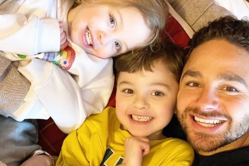 Adam Thomas with wife Caroline Daly and children