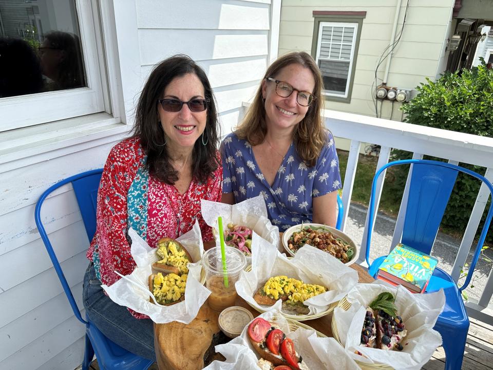 Me, my toasts and Katonah Reading Room Owner Gretchen Menzies in Katonah. Photographed June 21, 2023