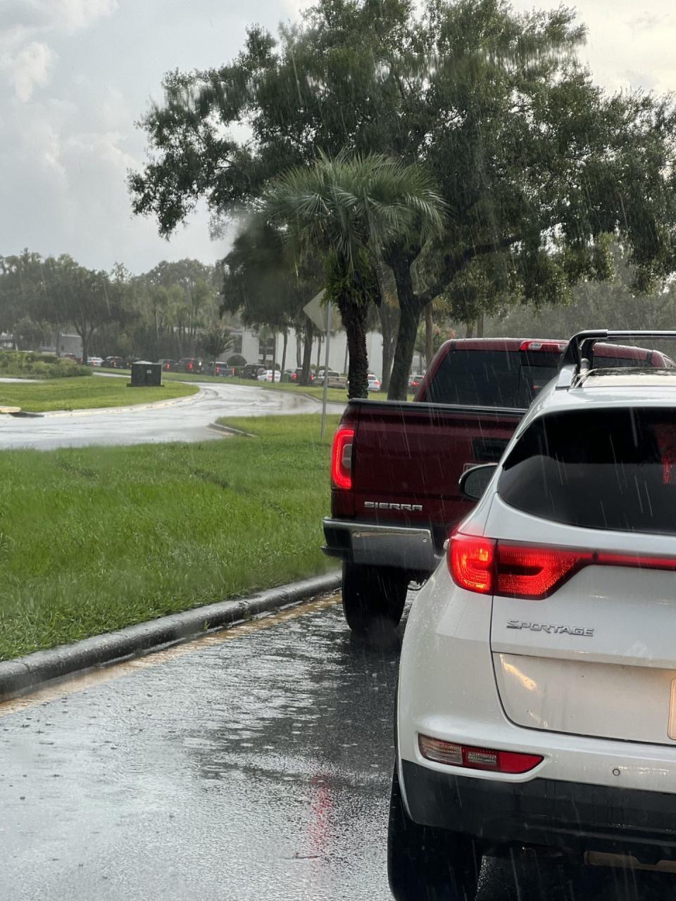 Imperial Lakes Boulevard in Mulberry backed up Thursday afternoon after the roadway flooded with over 2 feet of water after a rainstorm, rendering it nearly impassible to residents. Its a long-term problem homeowners say Polk County has failed to address.