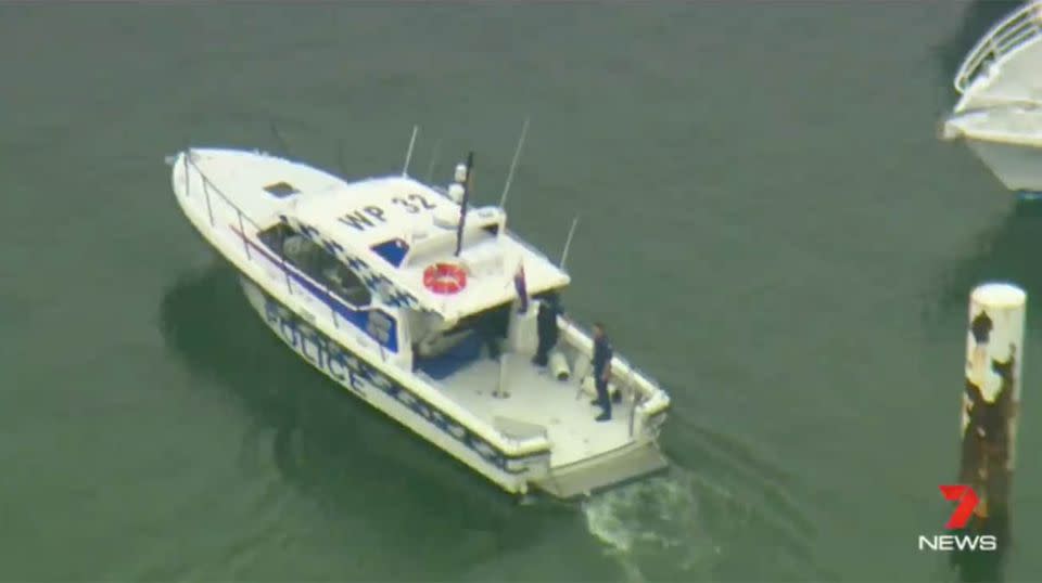 A member of the public transferred the woman to a water police vessel shortly after 9am Monday. Source: 7 News