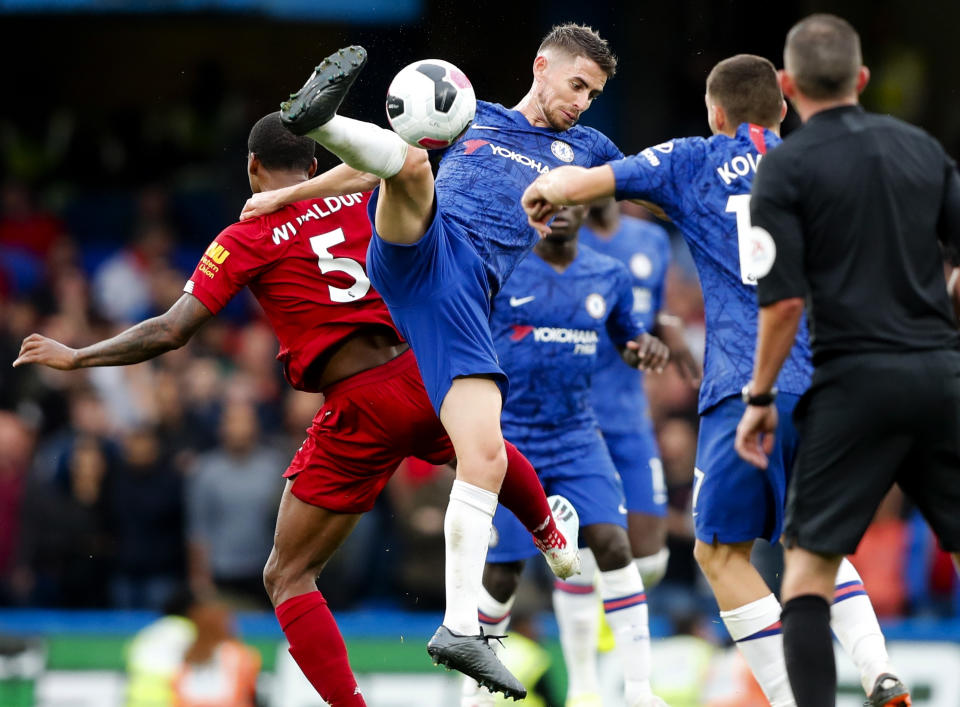 Chelsea's Jorginho goes for the ball during the British Premier League soccer match between Chelsea and Liverpool, at the Stamford Bridge Stadium, London, Sunday, Sept. 22, 2019. (AP Photo/Frank Augstein)