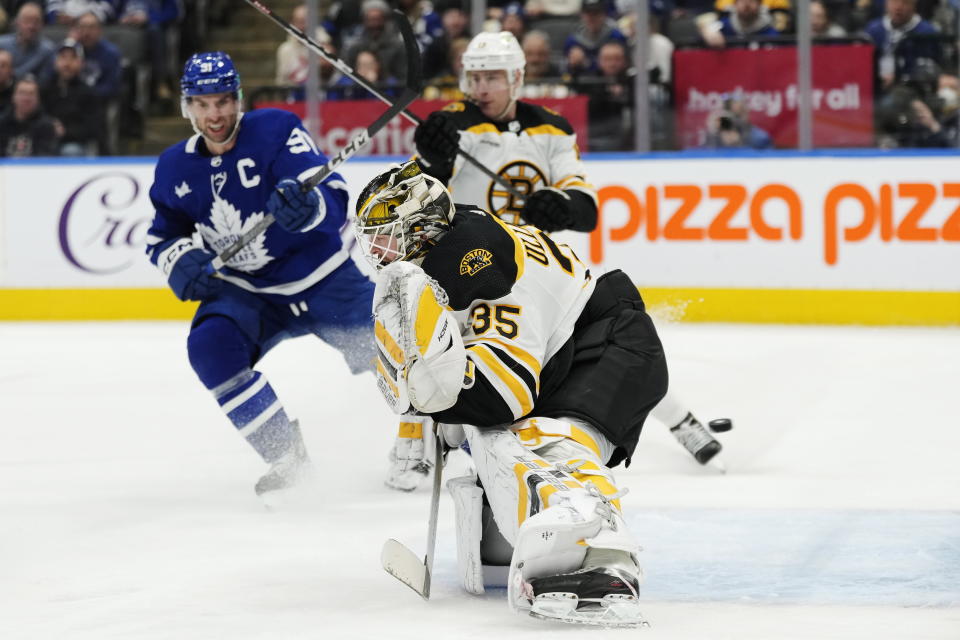 Boston Bruins' goaltender Linus Ullmark (35) is scored on by Toronto Maple Leafs' Mitchell Marner (not shown) during the second period of an NHL hockey game, Wednesday, Feb.1, 2023 in Toronto. (Frank Gunn/The Canadian Press via AP)