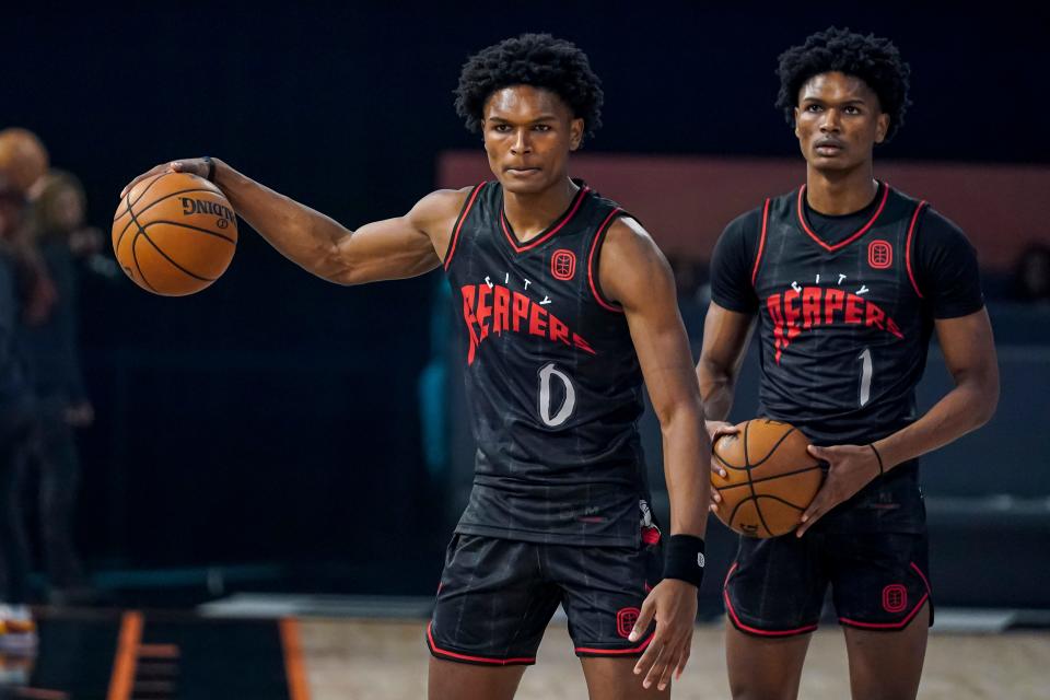 Ausar Thompson, left, and Amen Thompson could become the first brothers to be selected in the top 10 of the NBA draft in the same year.
