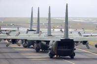 In this Nov. 11, 2018 photo, South Korea's Air Force cargo planes C-130 carrying boxes of tangerines, is seen before its take off for North Korea at the Jeju International Airport on Jeju Island, South Korea. South Korea has airlifted thousands of boxes of tangerines to North Korea in return for the North's large shipments of pine mushrooms in September.(Park Ji-ho/Yonhap via AP)