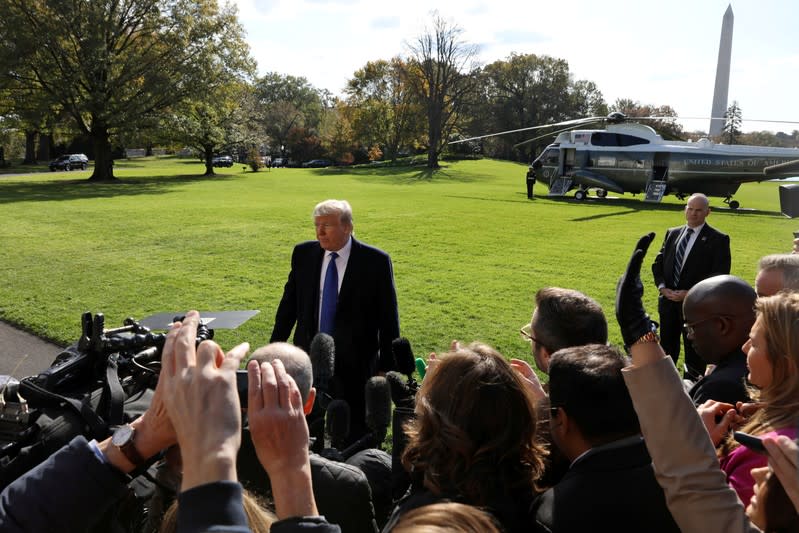 U.S. President Donald Trump boards Marine One to depart for travel to Georgia from the South Lawn of the White House