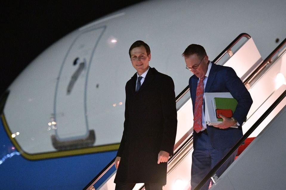 Senior Advisor to President Trump Jared Kushner (L) and White House Acting Chief of Staff Mick Mulvaney step off Air Force One upon arrival at Andrews Air Force Base in Maryland on November 4, 2019.