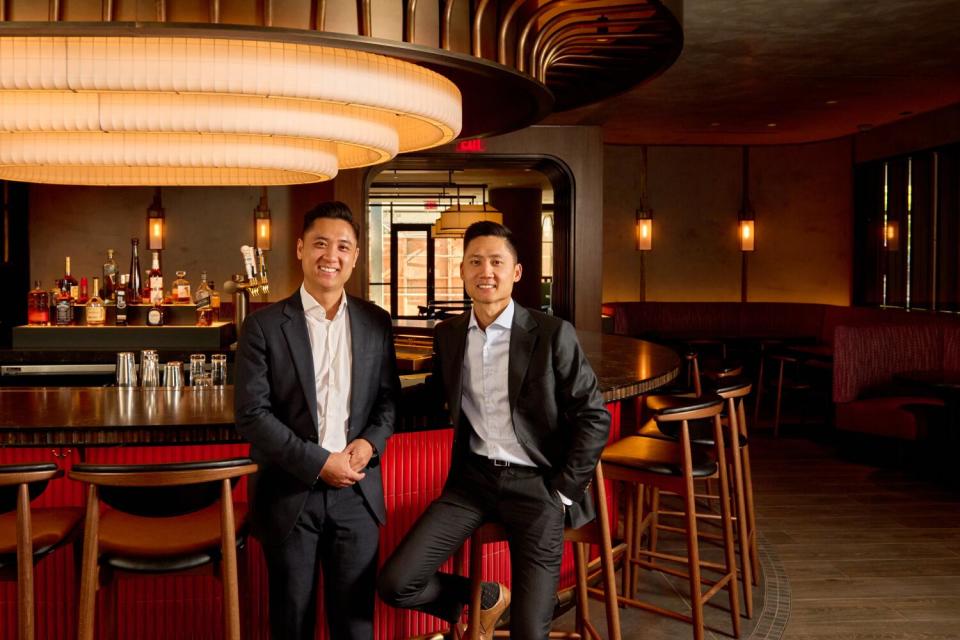 Brothers Aaron and Albert Yang in the bar at Din Tai Fung.