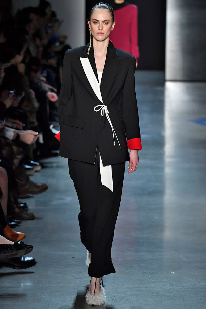 <p>Model wears a black-and-white contrast pansuit at the fall 2018 Prabal Gurung show. (Photo: Getty Images) </p>