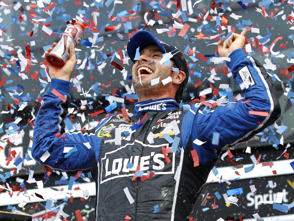 FILE - Jimmie Johnson celebrates after winning the Daytona 500 NASCAR Sprint Cup Series auto race, Sunday, Feb. 24, 2013, at Daytona International Speedway in Daytona Beach, Fla. (AP Photo/Terry Renna, File)