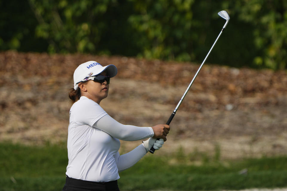 Kim Sei Young of South Korea hits from the fairway on the second hole during the third round of the LPGA Maybank Championship in Kuala Lumpur, Malaysia, Saturday, Oct. 28, 2023. (AP Photo/Vincent Thian)