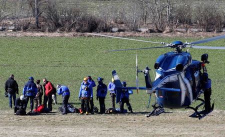 A rescue helicopter from the French Gendarmerie takes off with Alpine rescue specialists for the crash site of an Airbus A320, near Seyne-les-Alpes, March 26, 2015. REUTERS/Jean-Paul Pelissier