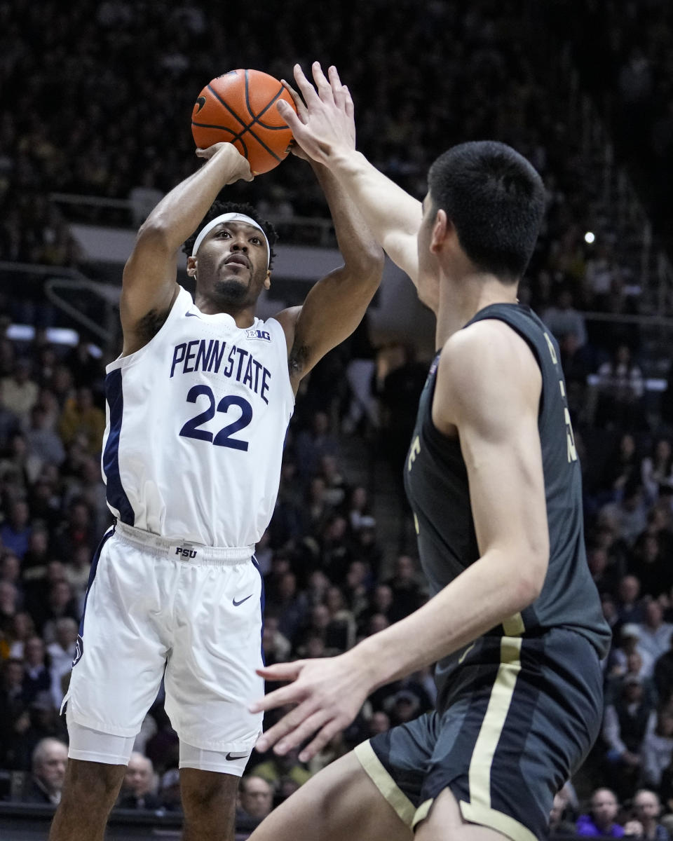 Penn State guard Jalen Pickett (22) shoots over Purdue center Zach Edey (15) during the first half of an NCAA college basketball game in West Lafayette, Ind., Wednesday, Feb. 1, 2023. (AP Photo/Michael Conroy)