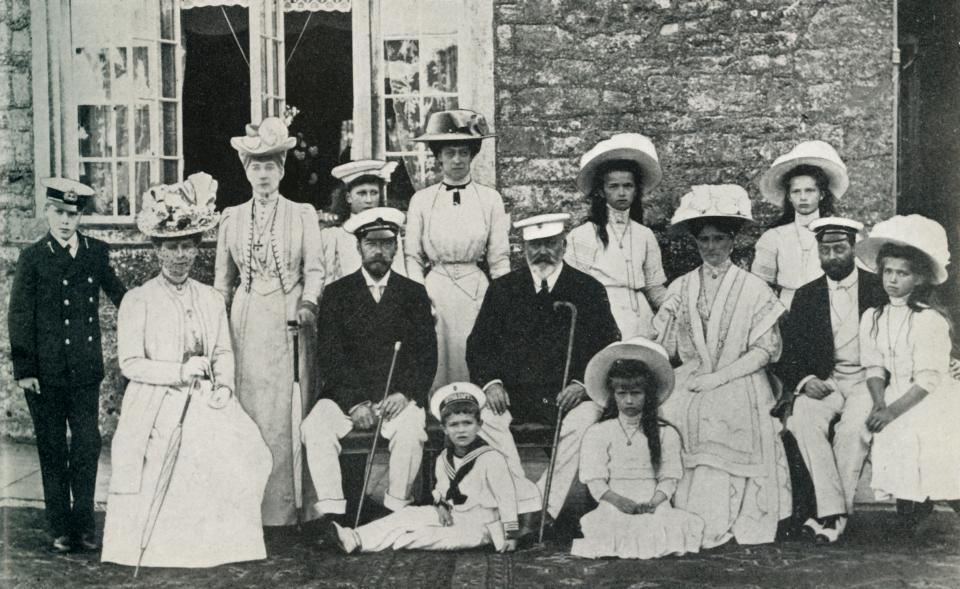 The Windsor and Romanov families pose together for a portrait in 1909.