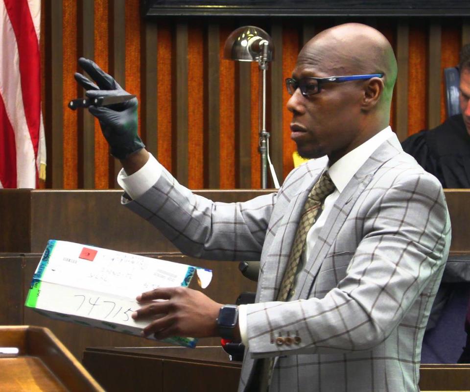 District Attorney Stacey Jackson shows jurors the knife authorities say Jayvon Rayshawn Hatchett used to stab Michael Hunt in 2020. 03/21/2023 Mike Haskey/mhaskey@ledger-enquirer.com