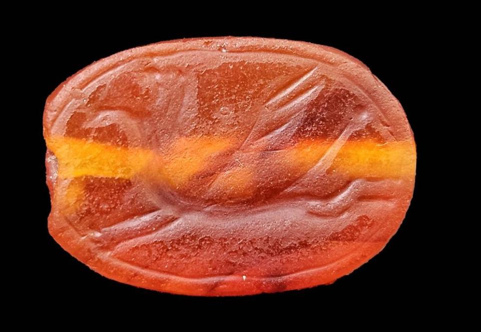 The winged creature carved on the back of a scarab-shaped amulet. / Credit: Israel Antiquities Authority